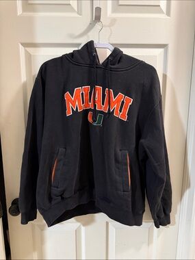 Vintage Champs Black Miami Hoodie with Orange & Green Logo